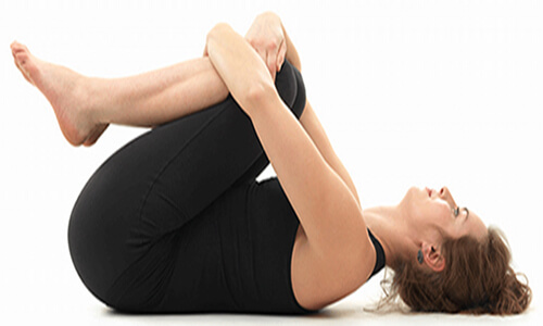 Knees to Chest Pose - Apanasana - The Yoga Collective